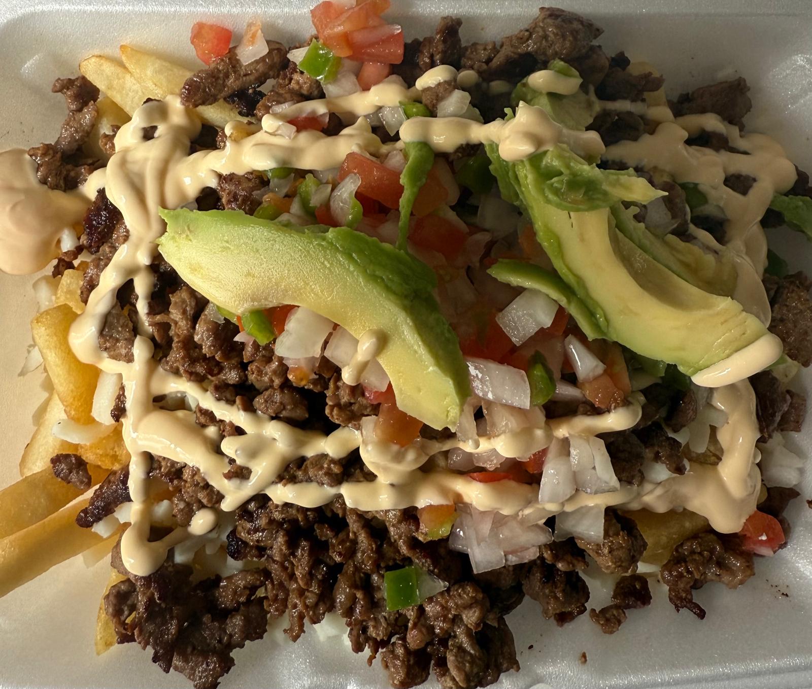 Papas con carne asada